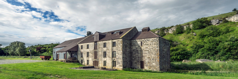 View of striking limestone Clarks Mill building